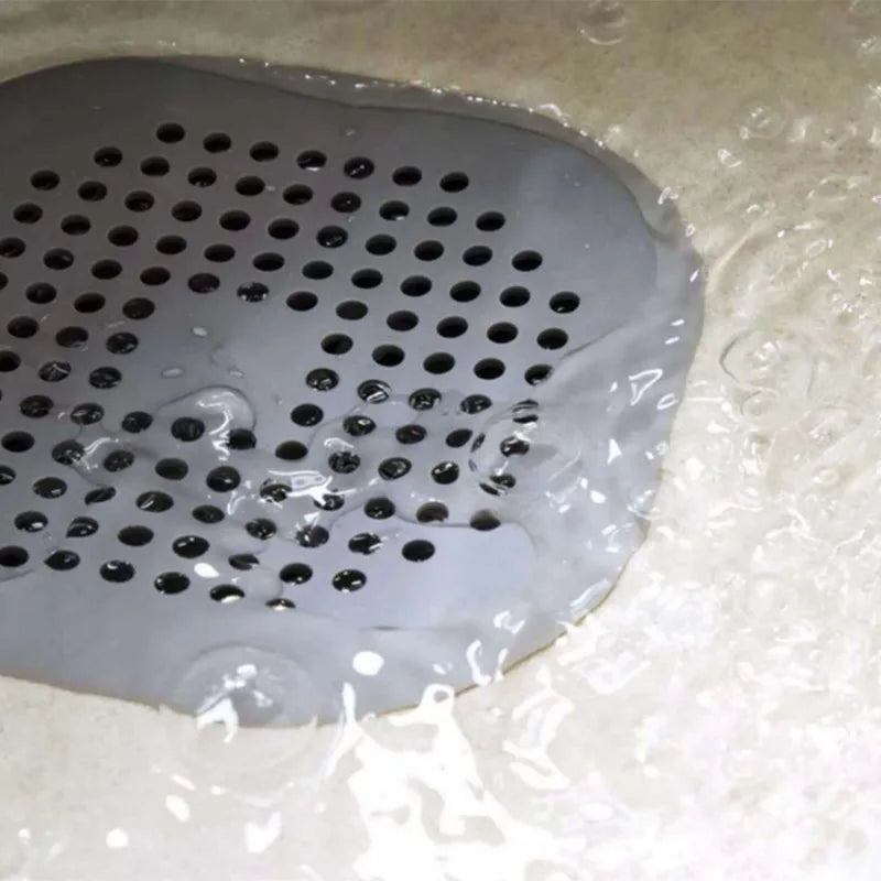 Shower drain strainer catching hair