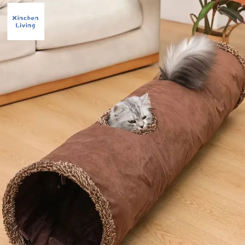Foldable suede cat tunnel in use during play