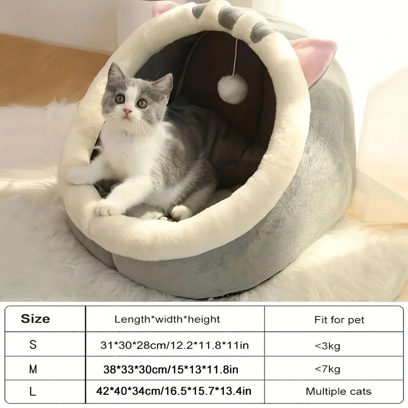 Cat sleeping in cozy cave nest