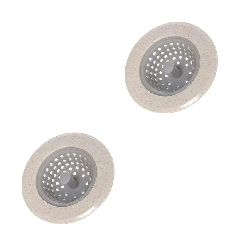 Kitchen sink strainer with easy-lift handle