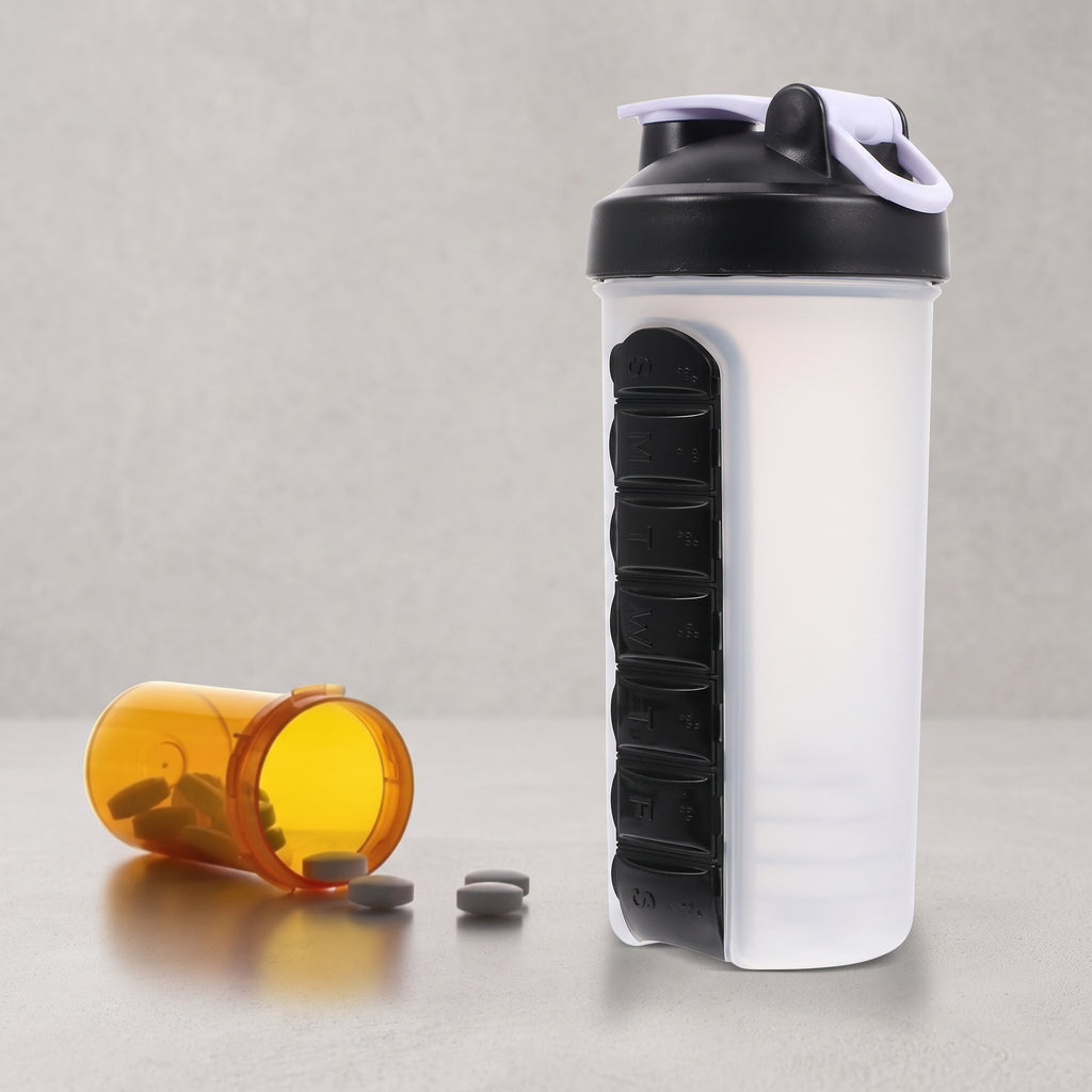 Black water bottle with detachable pill organizer for hydration and daily supplements