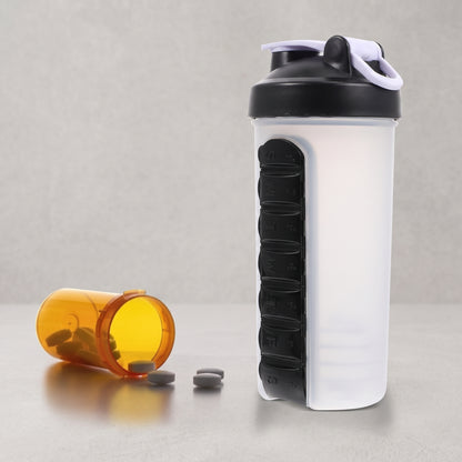 Black water bottle with detachable pill organizer for hydration and daily supplements