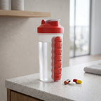 Black hydration bottle with seven individual compartments for pills and supplements