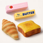 4-piece slow-rising bread squishy set with toast butter and croissant designs