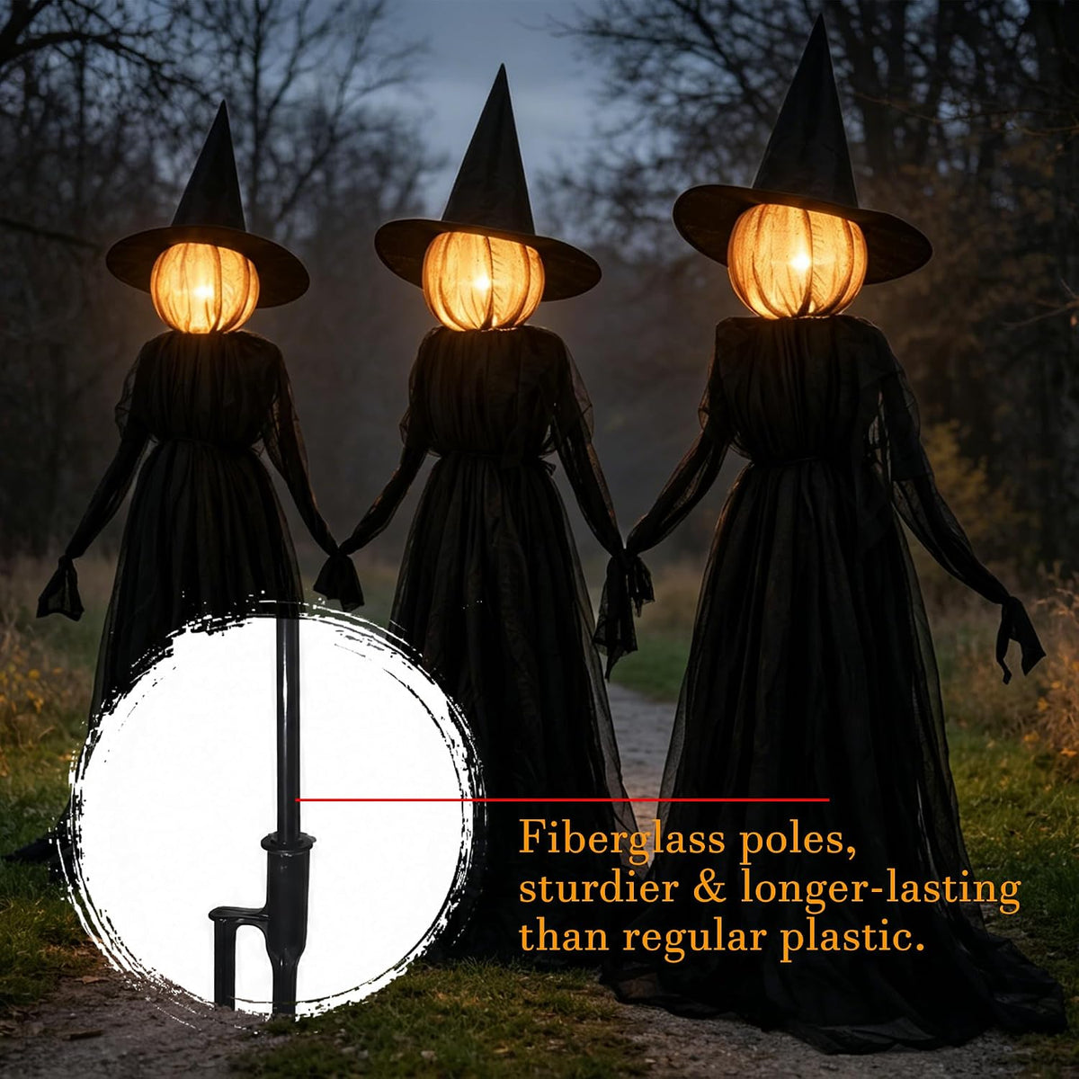 Light up Halloween witches holding hands in a spooky yard