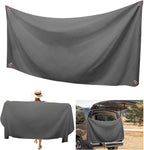 Sand-resistant beach towel with quick-dry fabric and oversized 75 x 30 inch design