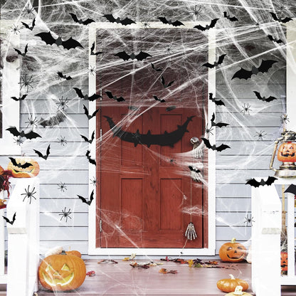Halloween cobweb decoration with realistic plastic spiders