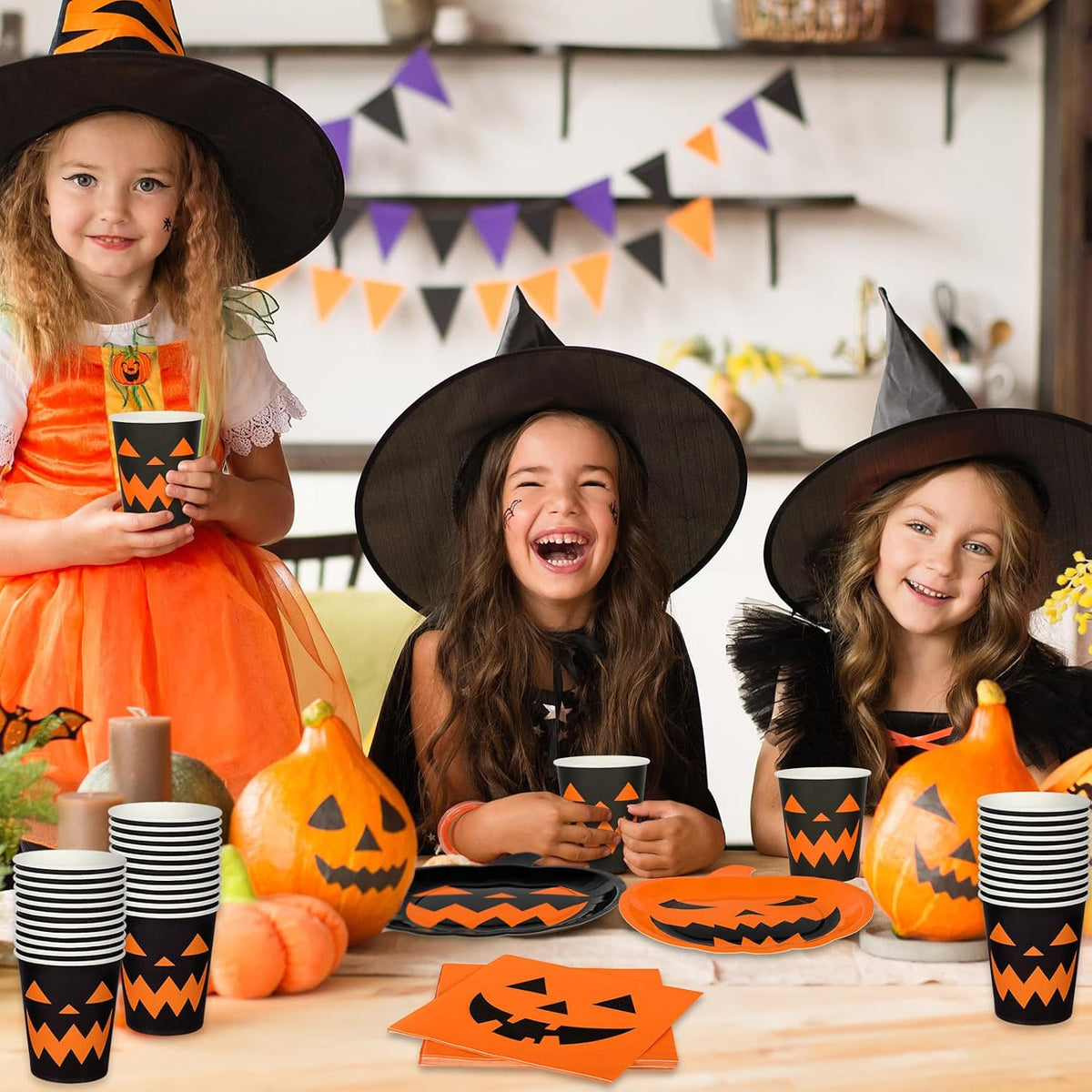 Halloween pumpkin party plates cups and napkins for birthday celebration