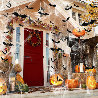 Halloween spider webs stretched across an indoor wall