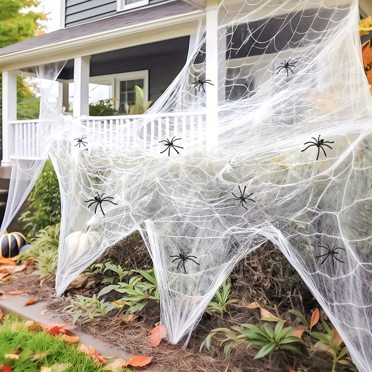 Halloween Spider Web Decorations with Fake Spiders