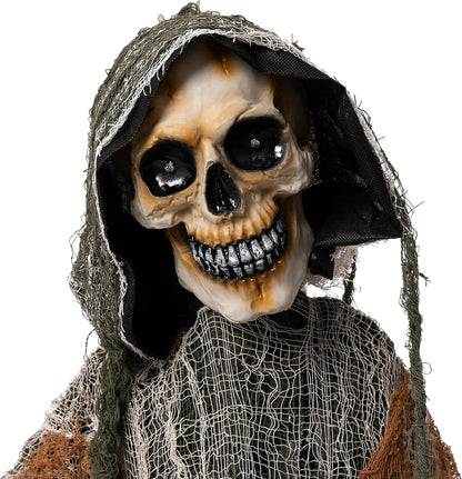 Life size Grim Reaper Halloween yard decoration with glowing eyes