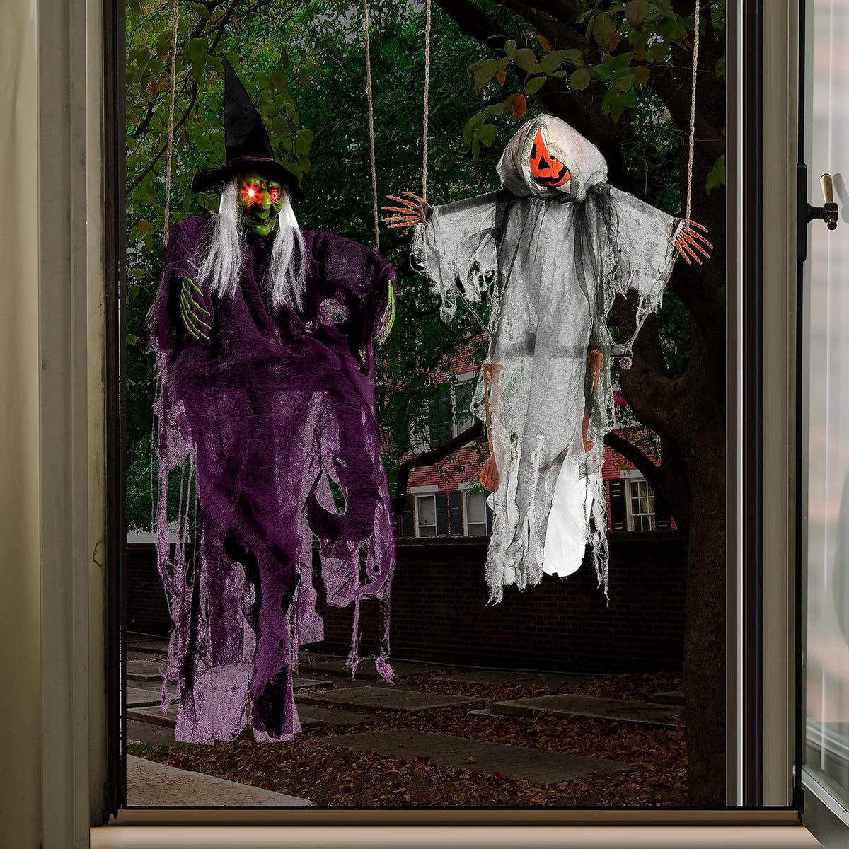 Halloween hanging witch and pumpkin decorations for yard display