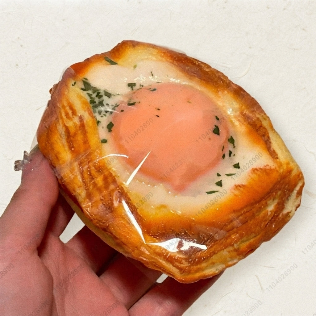 Big fried egg toast squishy with soft slow-rising squeeze texture