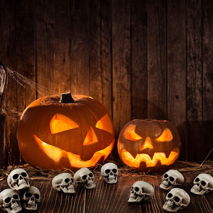 10 mini plastic skull heads for Halloween party decor