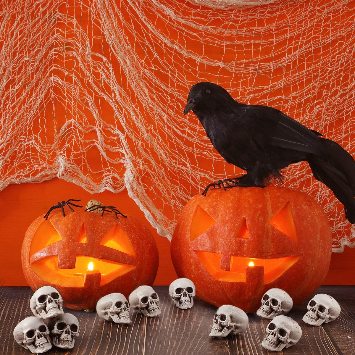 Small plastic skeleton skulls with detailed teeth and eye sockets