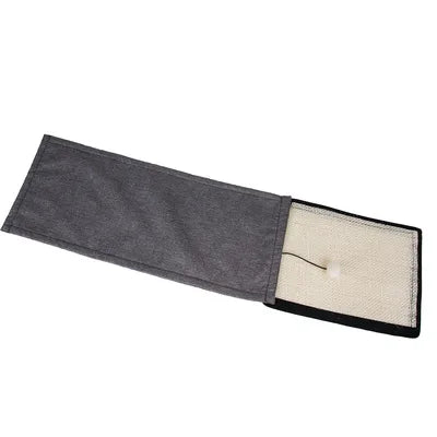 Cat scratching sisal mat on sofa