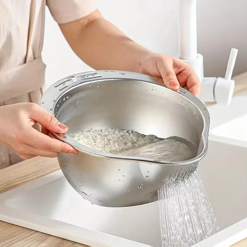 Rinsing rice in stainless steel strainer