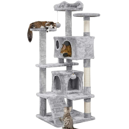 cat playing on corner cat tree with 2 condos