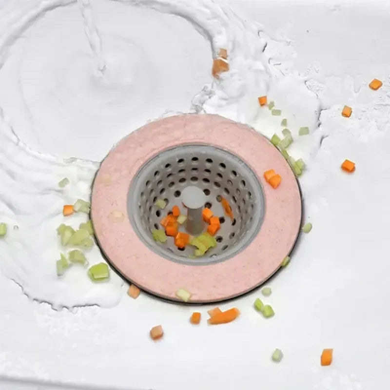 Lifting sink strainer by handle to empty waste
