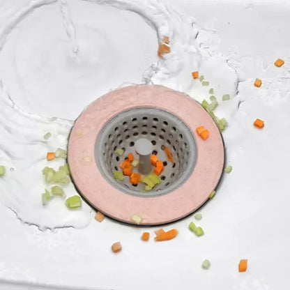 Lifting sink strainer by handle to empty waste
