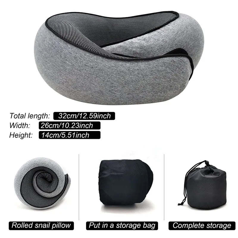 Traveler resting with snail neck pillow on airplane
