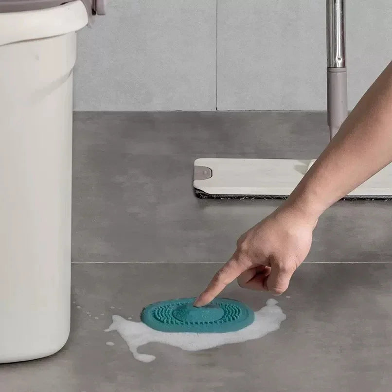 Kitchen sink drain strainer plug