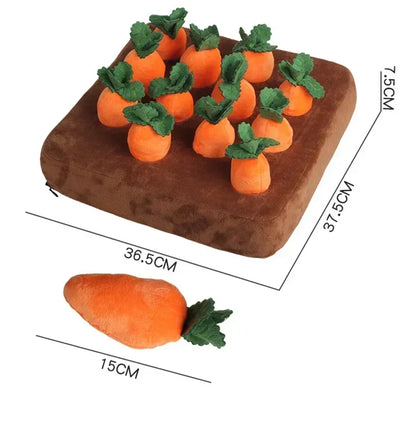 Dog pulling a plush carrot from a snuffle mat