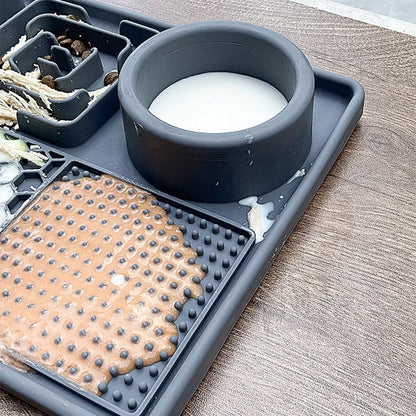 Dog eating from silicone slow feeder