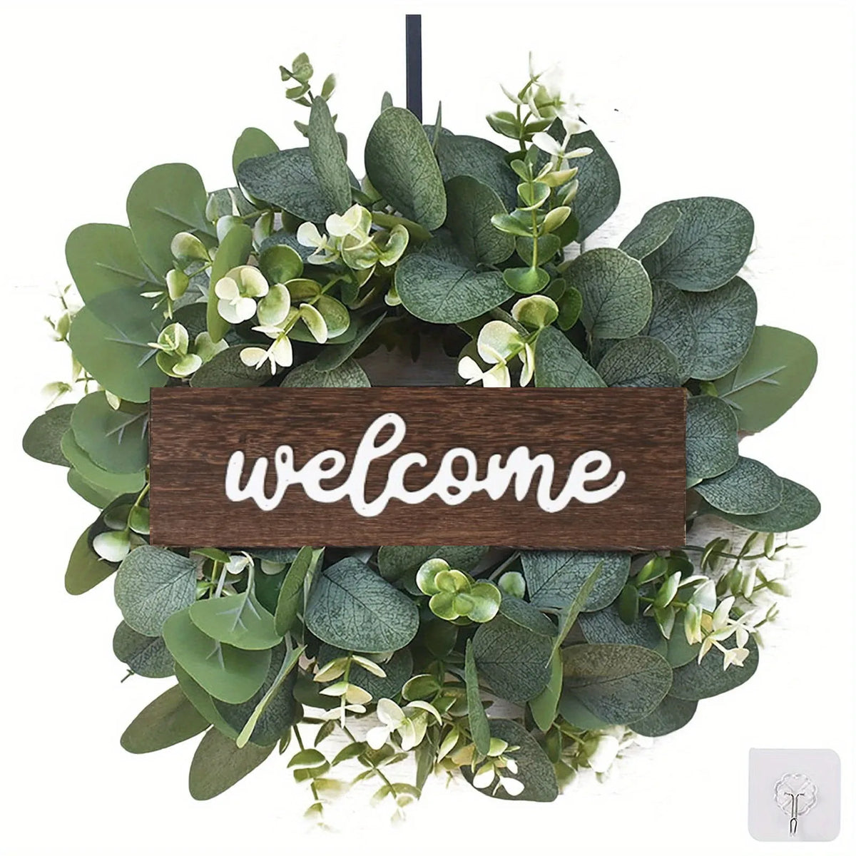 Eucalyptus welcome wreath with white berries and wooden Welcome sign