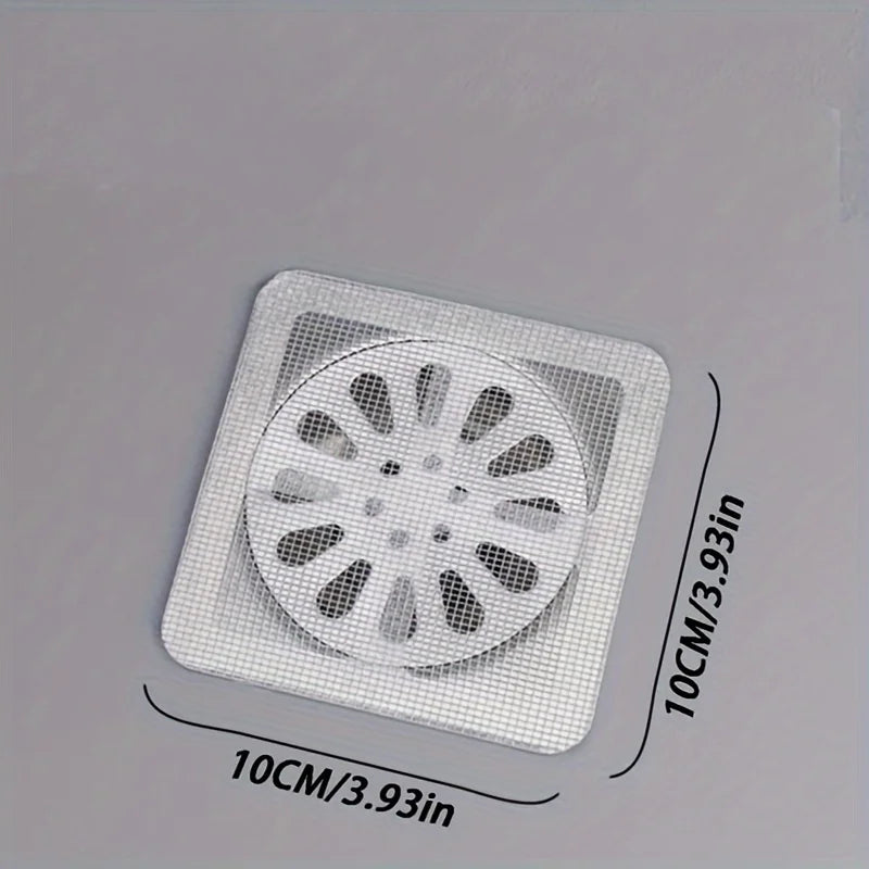 Hair catcher sticker over shower floor drain