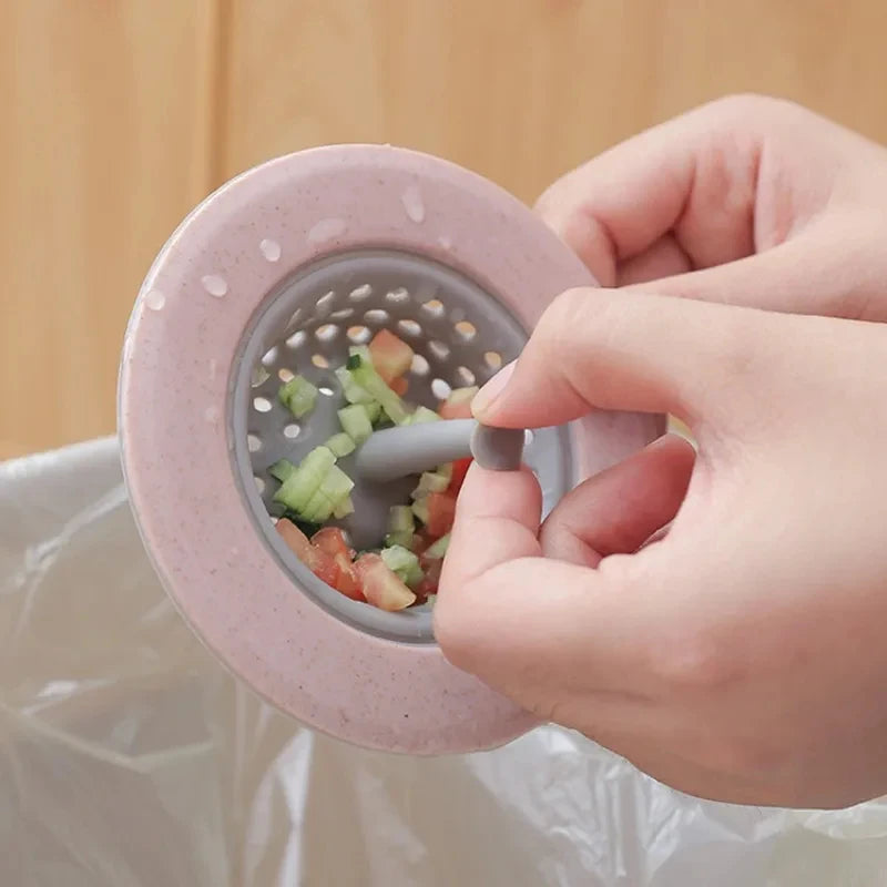 Sink strainer catching food scraps