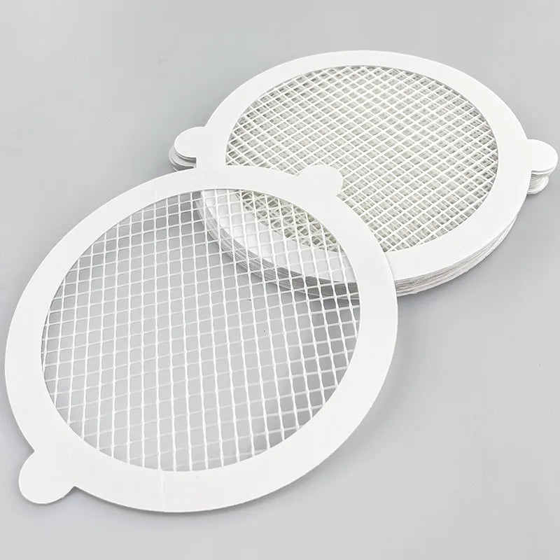 Peeling off used drain hair catcher sticker