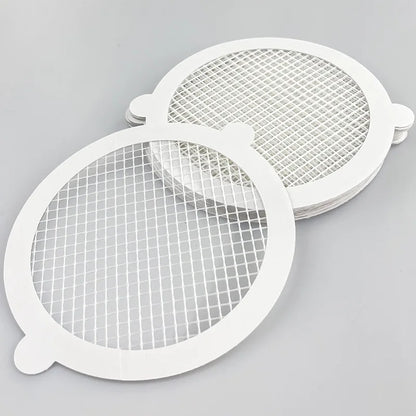 Peeling off used drain hair catcher sticker