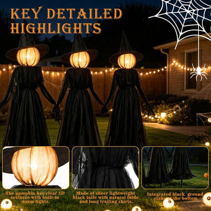 Three 5 ft black robed witches with glowing faces