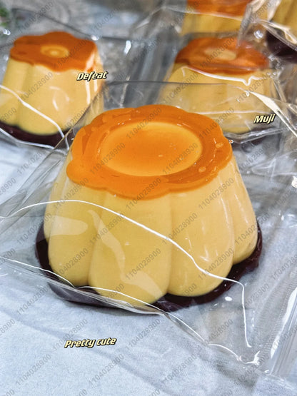 Caramel-colored pudding squishy toy with rounded shape for satisfying squeezes