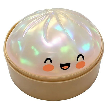 Rare glitter bun squishy displayed inside a decorative cage-shaped base